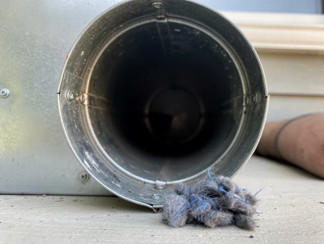 East Hemet Dryer Vent Cleaning technician using specialized equipment to clear severe dryer vent blockage in East Hemet